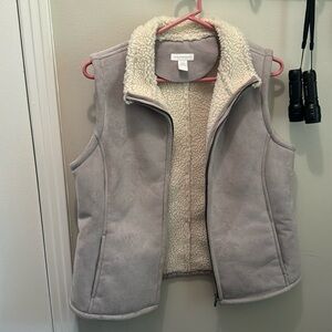 Like gray wool vest never been worn the brand is charter club size medium